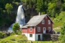 Traditional House and Waterfall in Norway